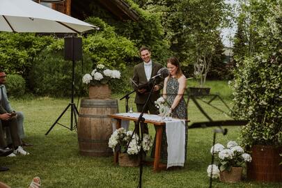 Pascal and another women stand in front of the audience